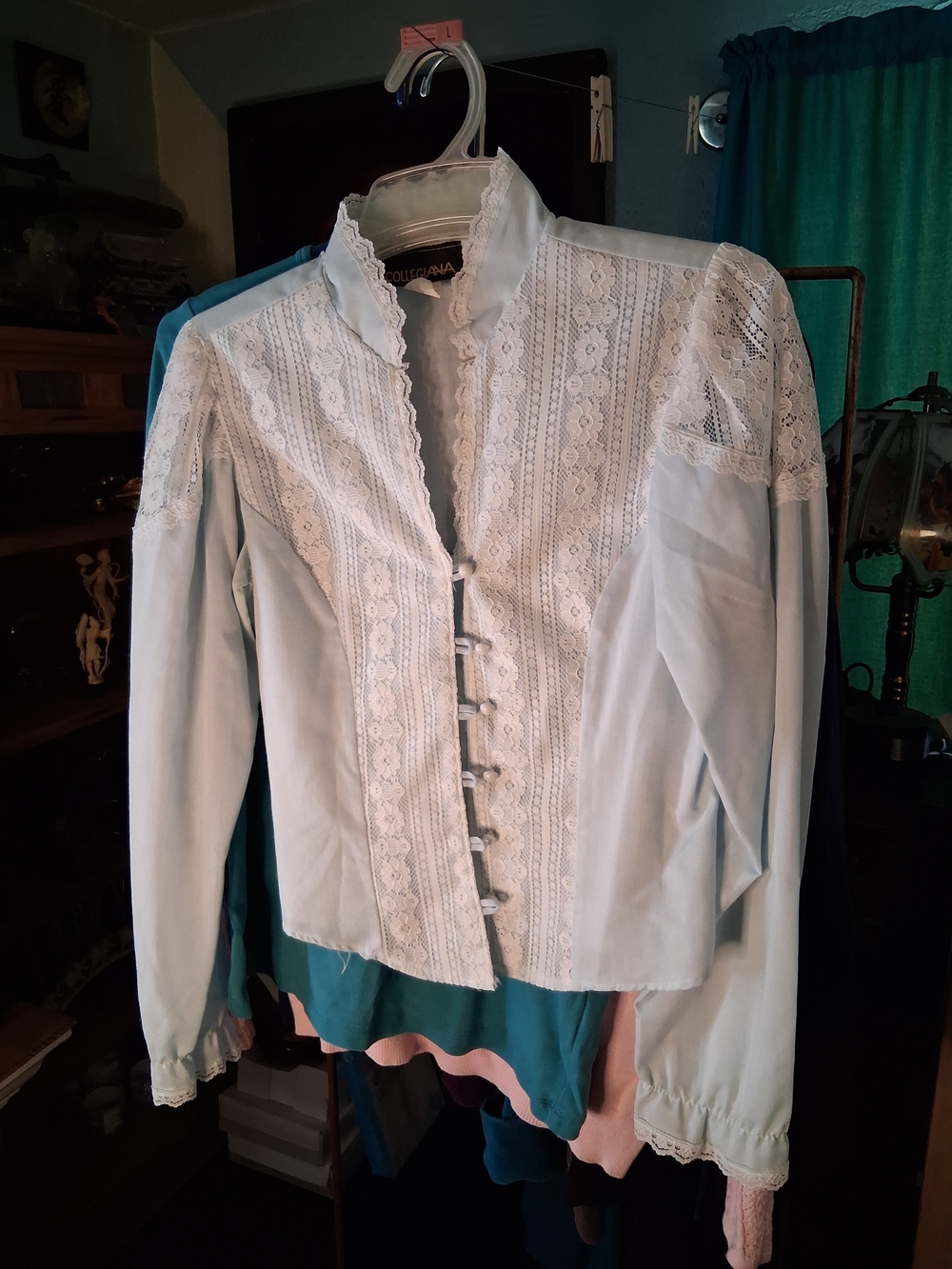 Light Blue Lace-Trim Women's Blouse with Decorative Front Closures